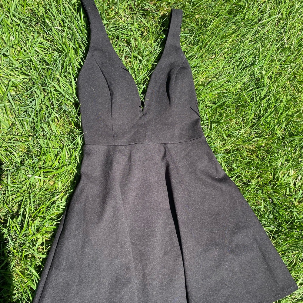 Amazing little black dress with open back